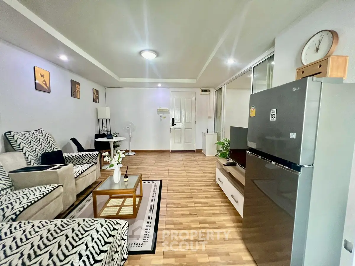 Modern living room with stylish decor and sleek appliances