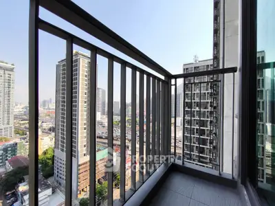 Stunning city view from a modern high-rise balcony, perfect for urban living.