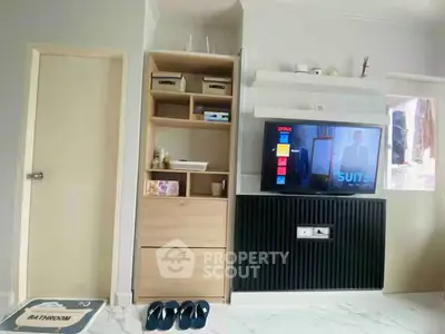 Modern living room with stylish TV setup and storage solutions