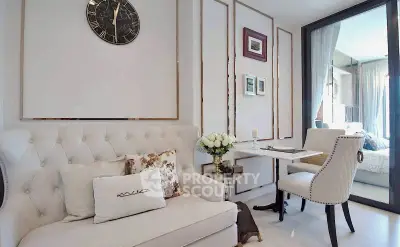 Elegant living room with plush seating and stylish decor, perfect for modern living.