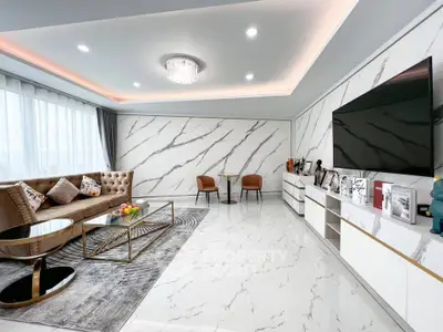 Luxurious modern living room with marble accents and elegant furniture