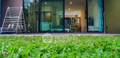 Charming ground-floor unit with lush garden view and spacious interior, perfect for modern living.