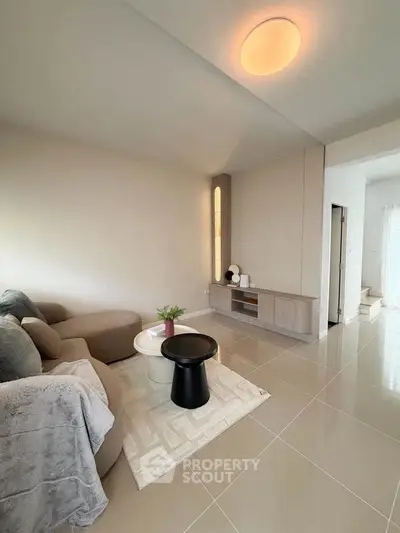 Modern living room with sleek furniture and elegant decor