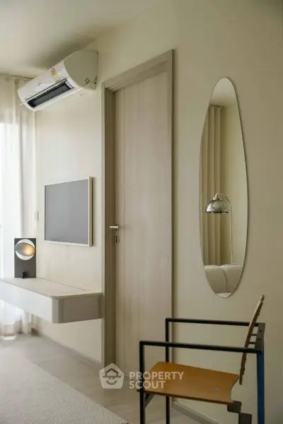 Modern living room with sleek air conditioning and stylish decor