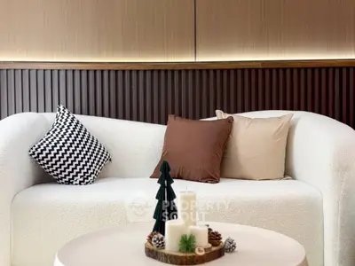 Stylish modern living room with cozy sofa and decorative accents