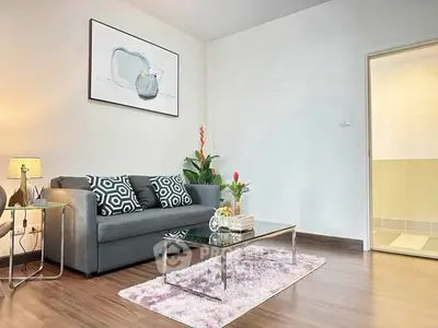 Stylish living room with modern decor and cozy ambiance, perfect for relaxation and entertaining guests.