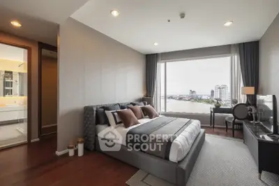 Luxurious bedroom with stunning city view and elegant decor