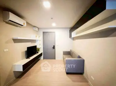 Modern living room with sleek design and wall-mounted TV