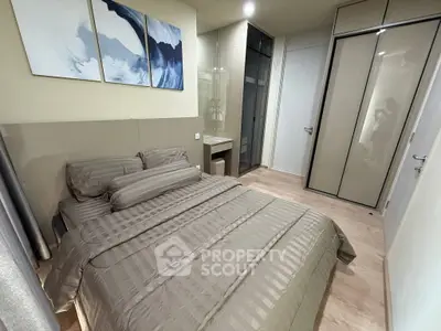 Modern bedroom with sleek design and ample storage space