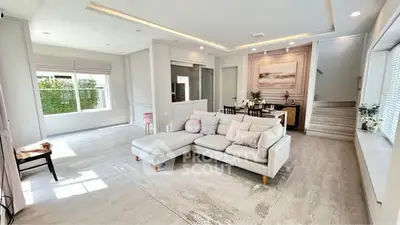 Spacious modern living room with elegant decor and natural light