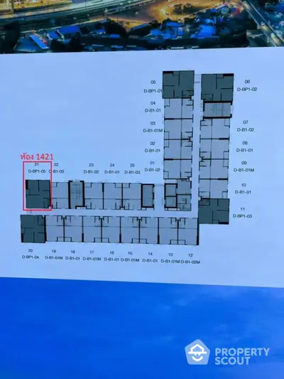 Floor plan layout of a modern apartment building with unit numbers and corridors.