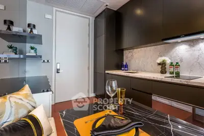 Luxurious modern kitchen with sleek cabinetry and elegant marble backsplash