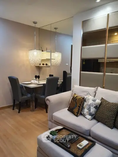 Elegant living room with modern dining area and stylish decor