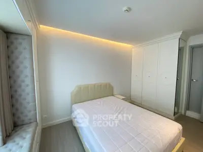 Modern bedroom with elegant design and built-in wardrobe