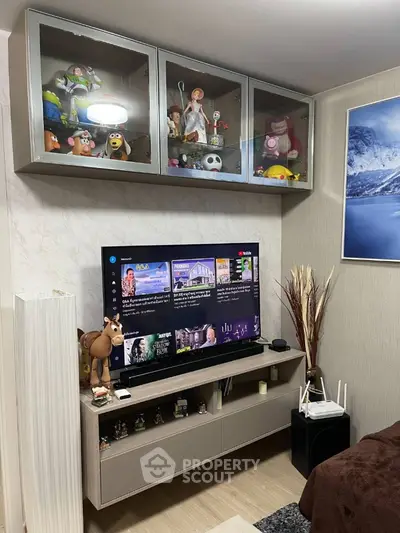 Cozy living room with modern TV setup and stylish decor