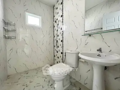 Modern bathroom with stylish tile design and sleek fixtures