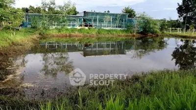 Scenic rural property with pond and lush greenery