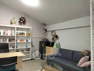Cozy living room with modern furniture and decorative shelving