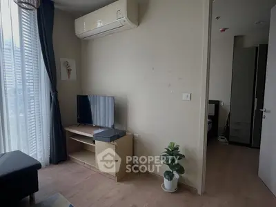 Cozy living room with air conditioning and modern decor