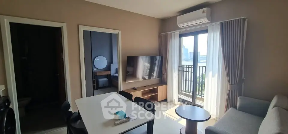 Modern living room with balcony view in stylish apartment