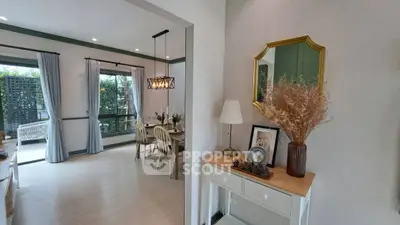 Elegant dining room with natural light and stylish decor
