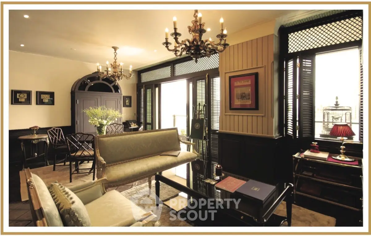 Luxurious living room with elegant chandeliers and classic furniture, perfect for sophisticated gatherings.