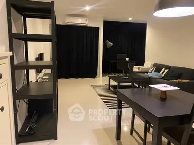 Modern living room with sleek furniture and open layout, perfect for urban living.