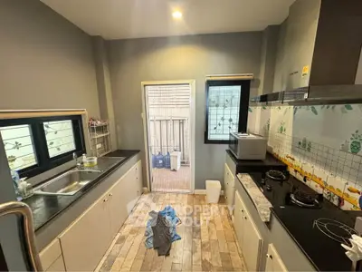 Modern kitchen with gas stove and ample counter space