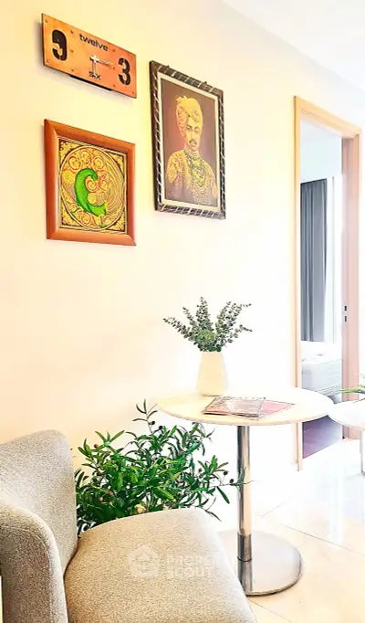 Stylish modern living room corner with elegant decor and cozy seating area.