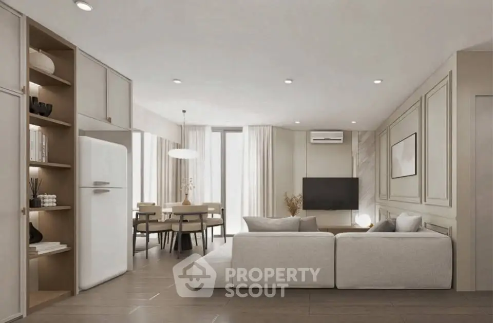 Modern living room with open dining area, stylish decor, and natural light.