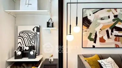 Stylish living room with modern art and chic decor accents.