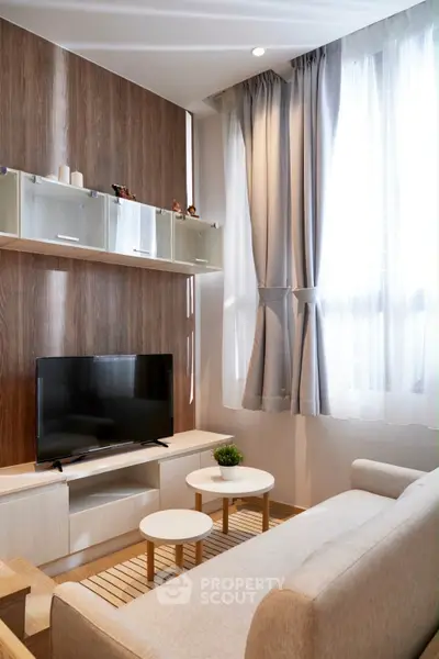 Modern living room with sleek furniture and natural light