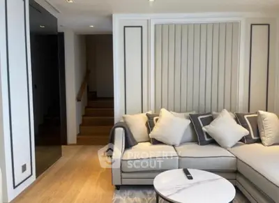 Elegant living room with modern sectional sofa and stylish decor