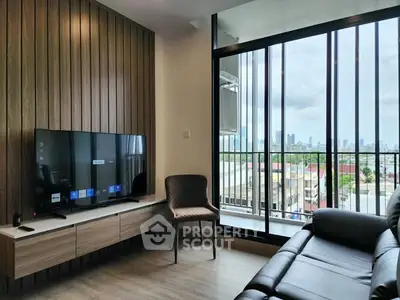 Modern living room with city view and sleek furniture