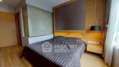 Modern bedroom with stylish wooden accents and cozy lighting