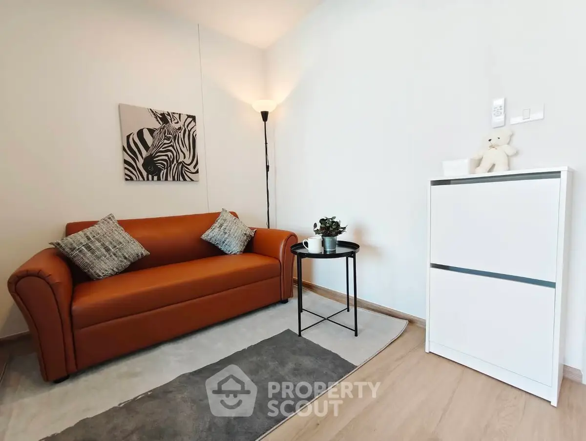 Cozy living room with stylish sofa and modern decor