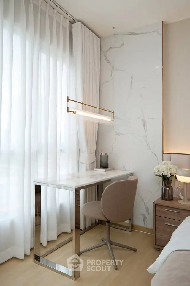 Elegant study nook with marble accents and modern decor in a bright room