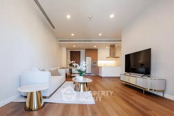 Luxurious modern living room with elegant decor and open kitchen layout