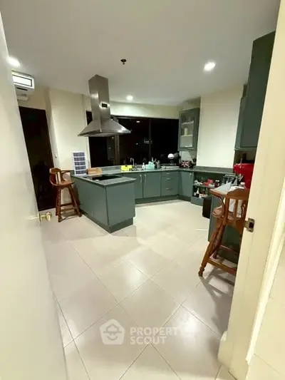 Spacious kitchen with modern appliances and open layout