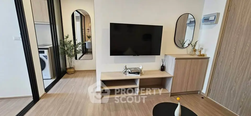 Modern living room with sleek TV setup and stylish decor