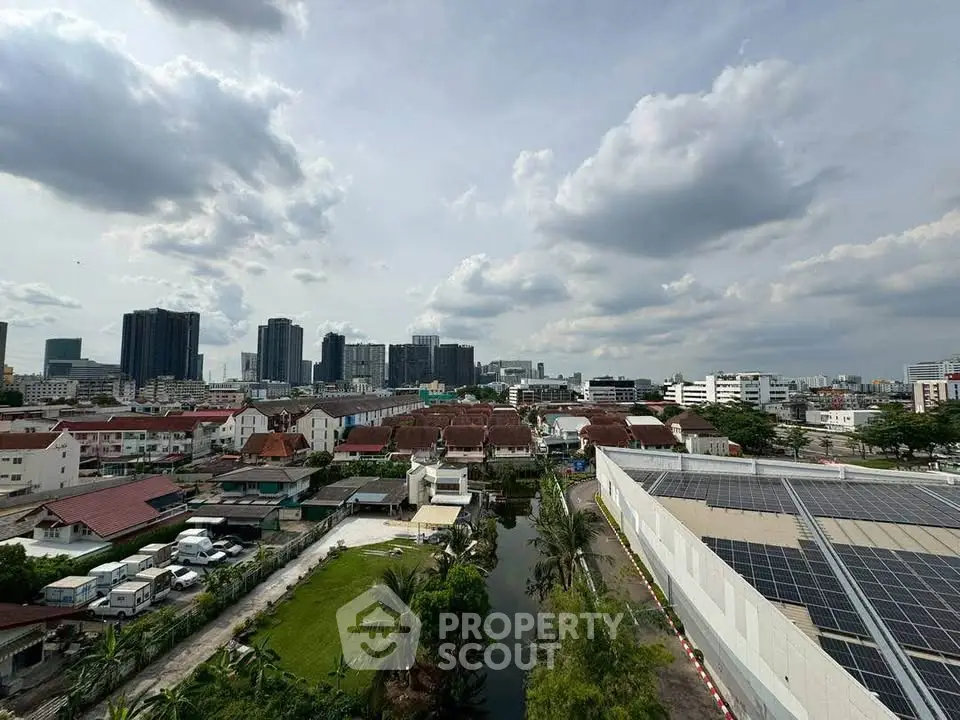 Stunning cityscape view with modern buildings and lush greenery, perfect for urban living enthusiasts.