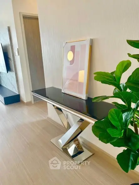 Modern interior with sleek console table and stylish decor in a bright living space.