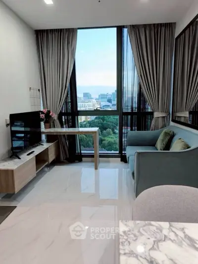 Modern living room with city view, sleek furniture, and large windows.