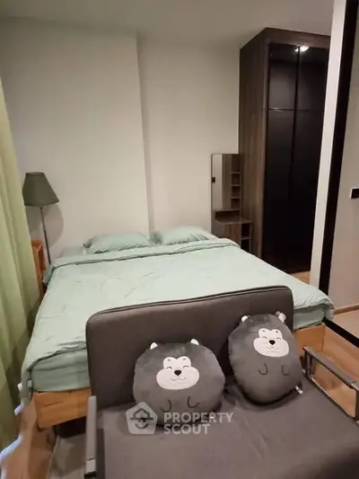 Cozy bedroom with modern decor and stylish furniture, perfect for relaxation and comfort.