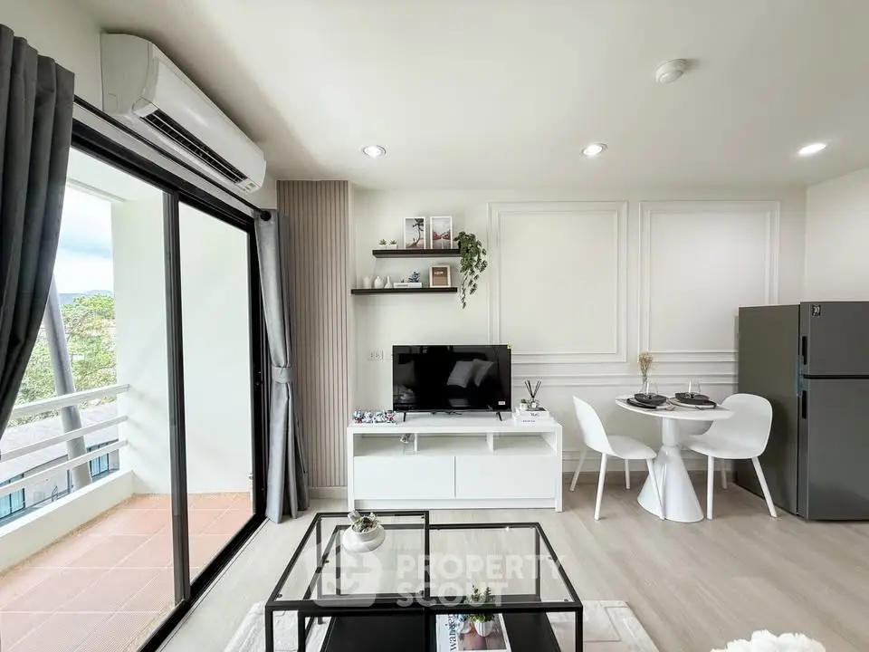 Modern living room with balcony, stylish decor, and dining area in a bright apartment.