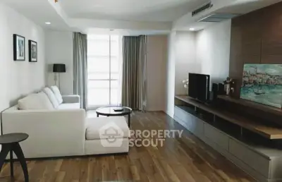 Spacious modern living room with elegant decor and natural light