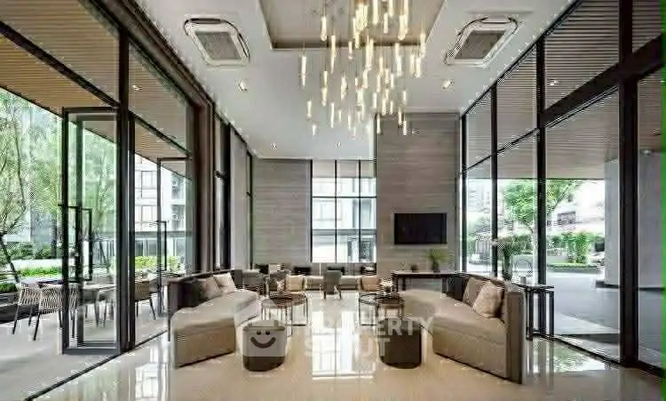 Luxurious modern living room with high ceilings and elegant lighting in a contemporary building.