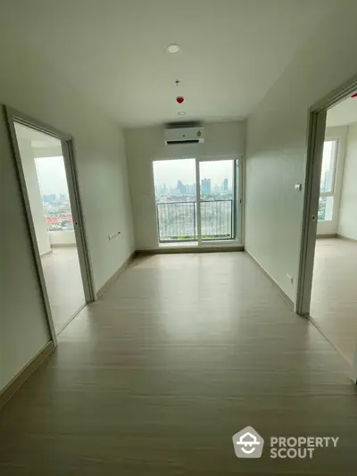 Spacious apartment with city view and modern flooring