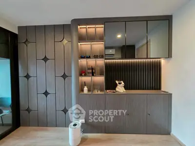 Modern living room with stylish built-in cabinets and elegant decor