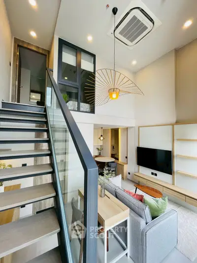 Modern duplex living room with stylish decor and open layout